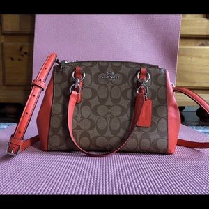 Tan and orange Coach bag.  Cross body or tote.